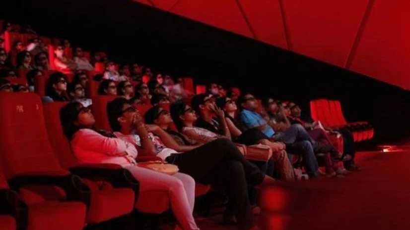 PVR to waive of convenience fee on online cinema ticket booking A file photo of cinema-goers wearing 3D glasses watch a movie at a PVR Multiplex in Mumbai