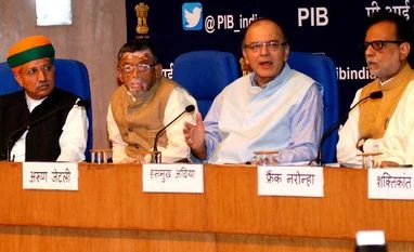GST roll out may improve ease of doing business: Govt Union Finance Minister, Arun Jaitley with Ministers of State for Finance, Santosh Kumar Gangwar and Revenue Secretary Hasmukh Adhia at a Press Conference on the Goods and Services Tax (GST) in New Delhi