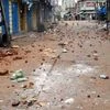 Brick pices spread on the road after clashes between two communities in Chhapra, Saran district of Bihar.