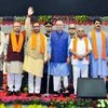 Gujarat chief minister Vijay Rupani (fifth from left) with Governor O P Kohli (centre) and Gujarat deputy chief minister Nitin Patel (fifth from right) with the new council of ministers after being sworn-in on Sunday at Mahatma Mandir in Gandhinagar