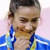 Majlinda Kelmendi, Kosovo, won the first ever medal in the country's history by clinching gold in under-52 kg Judo event
