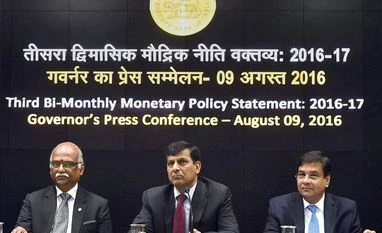 Expert Views: RBI expectedly keeps policy rate unchanged RBI Governor Raghuram Rajan along with RBI Deputy Governors R Gandhi and Urjit Patel during a press conference at the RBI headquarters in Mumbai.