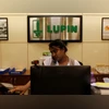 An employee of Lupin Limited works at a reception at their headquarters in Mumbai