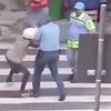 Screenshot of a thief grappling with a potential victim on a street in Rio de Janeiro. Source: YouTube
