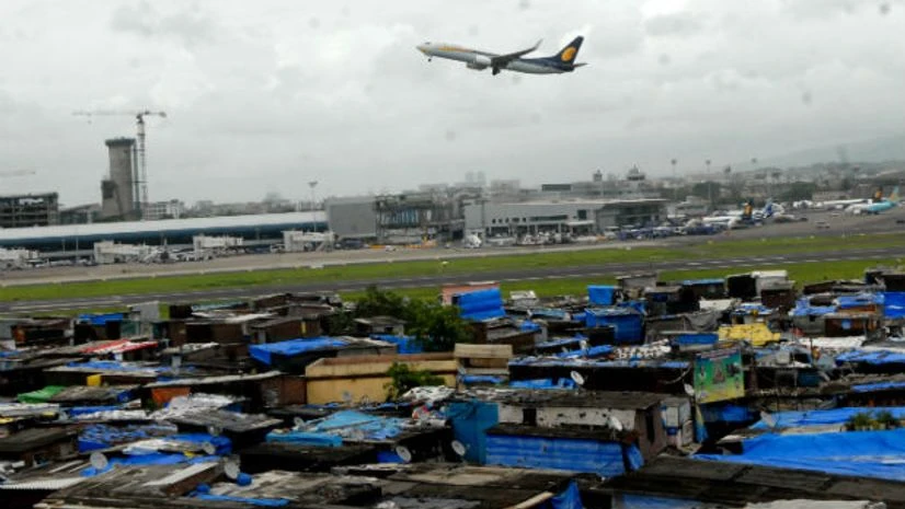 Maha Govt mulls change in DP for resettling slum dwellers around Mumbai airport Maha Govt mulls change in DP for resettling slum dwellers around Mumbai airport