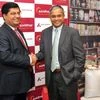 (From left to right) Paresh Rajde, Founder of Suvidhaa Infoserve and Rajiv Anand, Executive Director, Axis Bank at  a press conference in Mumbai to announce roll out of NanoCredit (Pic: Kamlesh Pednekar)