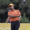 Anirban Lahiri of India watches his tee shot on the 3rd hold during the first round of the men's golf event