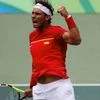 Marathon man Nadal into quarter-finals