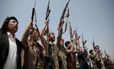 Saudi-led coalition intercepts ballistic missile attack by Houthi: Report Tribesmen loyal to Houthi rebels hold their weapons as they chant slogans during a gathering aimed at mobilizing more fighters into battlefronts in several Yemeni cities in Sanaa, Yemen.