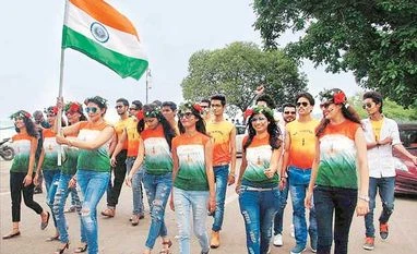 Govt releases new guidelines on national anthem for visually challenged Youngsters hold the tricolour as they gear up for Independence Day celebrations in Bhopal on Friday | Photo: PTI
