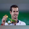 Andy Murray, of Britain, smiles as he holds up his gold medal at the 2016 Summer Olympics in Rio de Janeiro, Brazil. Andy Murray, of Britain, smiles as he holds up his gold medal at the 2016 Summer Olympics in Rio de Janeiro, Brazil.