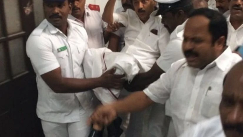 DMK chief Stalin being evicted out of the Tamil Nadu assembly DMK chief Stalin being evicted out of the Tamil Nadu assembly