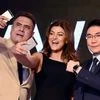 Bollywood actors Sushmita Sen and Boman Irani along with a Huawei official during launch of  Huawei P9 smartphone in New Delhi