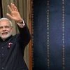 File Photo - Prime Minister Narendra Modi wearing a suit with his name woven into it in gold pinstripes