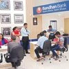 Customers at a Bandhan Bank branch in Kolkata