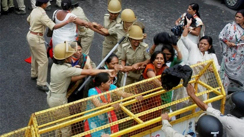 Police detain Congress workers and supporters at the party's Jan Akrosh Rally in Gandhinagar Police detain Congress workers and supporters at the party's Jan Akrosh Rally in Gandhinagar