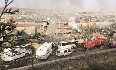 At least 11 police killed, 70 wounded in southeast Turkey PKK bomb attack Aftermath of car bombing Photo courtesy: Twitter user @BenjaminHarvey