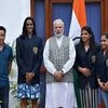 Prime Minister Narendra Modi poses with Olympic Medal Winners, Khel Ratna Awardees in New Delhi on Sunday
