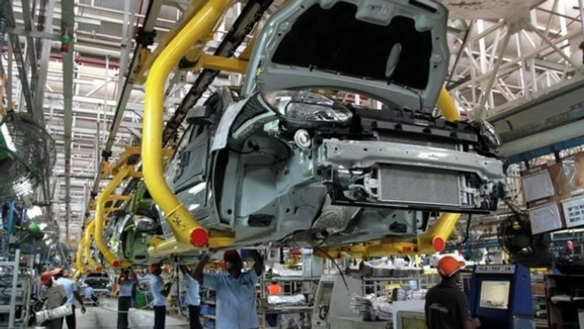 Representative image Workers assemble Ford cars at a plant of Ford India in Chengalpattu on the outskirts of Chennai