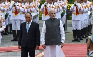 PM Modi's Vietnam visit aimed at piling pressure on China: Chinese Media Narendra Modi with his Vietnamese counterpart Nguyen Xuan Phuyc during his ceremonial reception at the Presidential palace in Hanoi, Vietnam