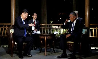 Obama, Xi discuss South China Sea dispute, human rights: White House US President Barack Obama and Chinese President Xi Jinping, drink tea together in a pavilion at West Lake State Guest House in Hangzhou in eastern China's Zhejiang province.
