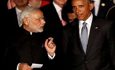 US President Barack Obama, center, chats with Indian Prime Minister Narendra Modi, left, as they and other leaders arrive for a family photo at the Xizi hotel in Hangzhou in eastern China's Zhejiang province. US President Barack Obama, center, chats with Indian Prime Minister Narendra Modi, left, as they and other leaders arrive for a family photo at the Xizi hotel in Hangzhou in eastern China's Zhejiang province.