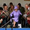 Britain's Queen Elizabeth II, centre, accompanied by Prince Philip, the Duke of Edinburgh, left and Prince Charles, attend the Braemar Royal Highland Gathering, at the Princess Royal and Duke of Fife Memorial Park in Braemar, Scotland.