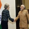 Prime Minister Narendra Modi shakes hands with UK Prime Minister Theresa May during a bilateral meeting at the G20 summit in Hangzhou, China.