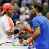 Lucas Pouille of France shakes hands with Rafael Nadal of Spain after winning their match during the fourth round of the US Open Tennis tournament in New York.