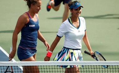 Sania Mirza and her Czech Republic partner Barbora Strycova breeze into US Open quarters Sania Mirza,(right) with her doubles partner Barbora Strycova, of the Czech Republic