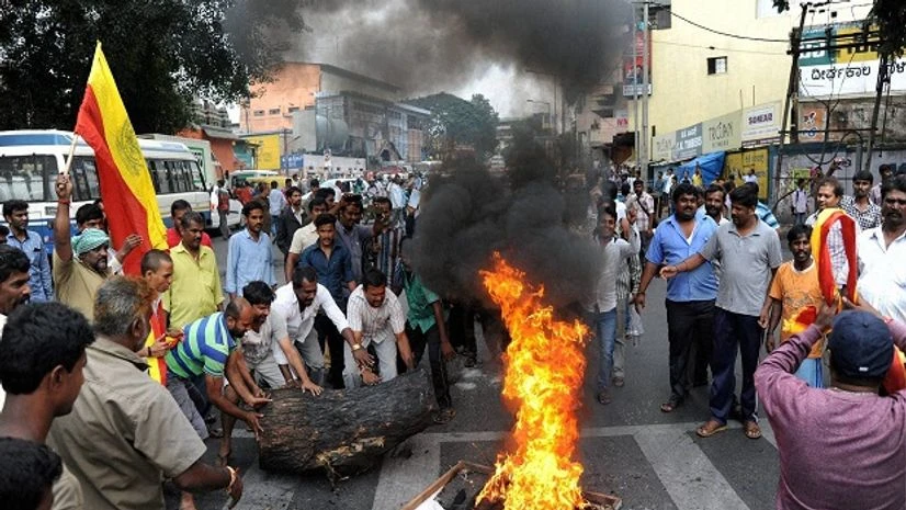 Kannada people holding a protest over Cauvery water row, in Mandya district Kannada people holding a protest over Cauvery water row, in Mandya district