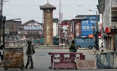 Kashmir remains shut for 70 consecutive days Security personnel guarding at Lal Chowk during curfew in Srinagar