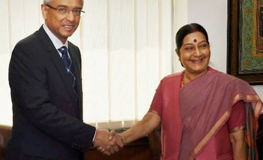 As Mauritius amends DTAC, India promises help for infra projects External Affairs Minister Sushma Swaraj with Mauritian Minister of Finance and Economic Development, Pravind Jugnauth in New Delhi