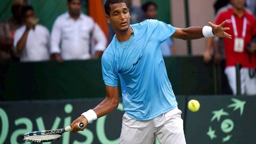 India's Ramkumar Ramanathan in action against Spain's Feliciano Lopez during the Davis Cup World Group Play off match. Photo: PTI India's Ramkumar Ramanathan in action against Spain's Feliciano Lopez during the Davis Cup World Group Play off match. Photo: PTI