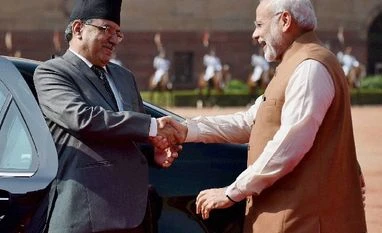 India-Nepal to set up oversight panel to expedite projects Prime Minister Narendra Modi greets Nepalese counterpart Pushpa Kamal Dahal during a ceremonial reception at Rashtrapati Bhavan in New Delhi