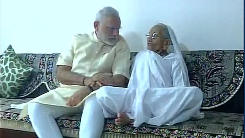 Prmine Minister Narendra Modi with his mother Prmine Minister Narendra Modi with his mother