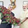 Prime Minister Narendra Modi being greeted by Chief Justice of India T S Thakur on his birthday in Gandhinagar on Saturday | Photo: PTI