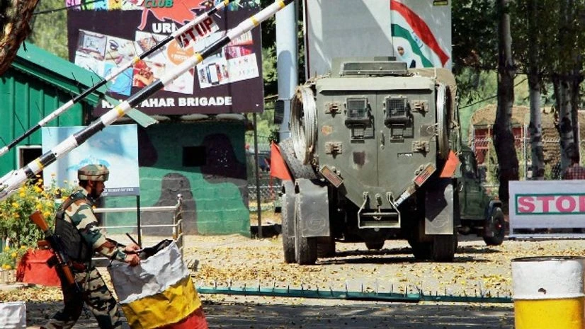 Army personnel in action inside the Army Brigade camp during a terror attack in Uri, Jammu and Kashmir. Army personnel in action inside the Army Brigade camp during a terror attack in Uri, Jammu and Kashmir.