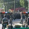 Army jawans carrying the coffins of their colleagues killed in Uri attack, at a tribute paying ceremony in Srinagar. Photo: PTI
