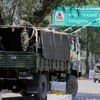 Army personnel in vehicles move inside the Uri Army Brigade Camp in Uri, Jammu and Kashmir.