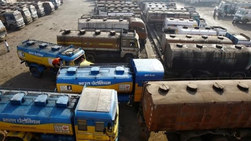 Oil tankers are seen parked at a yard outside a fuel depot Oil tankers are seen parked at a yard outside a fuel depot
