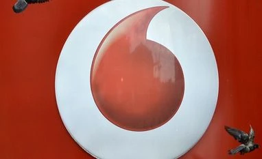 Jammu: 150 pigeons being used for espionage, probe ordered Pigeons fly past Vodafone branding outside a retail store in London. Photo: Reuters