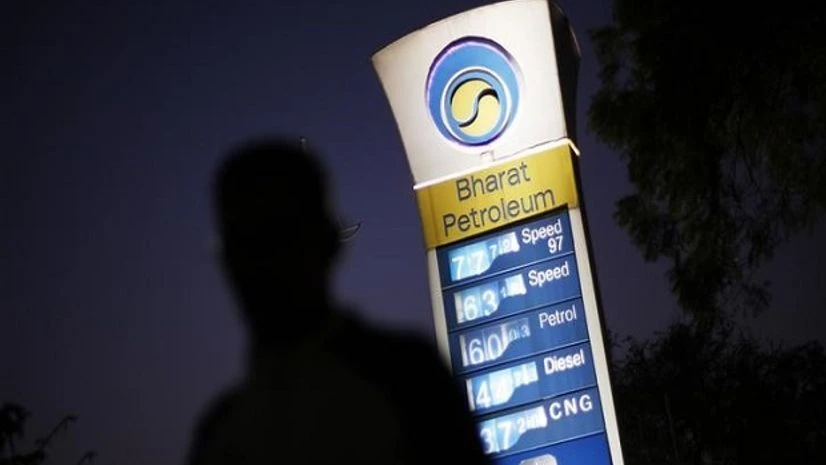 A Bharat Petroleum oil pump station displays the price of unleaded petrol (0.89$) and Diesel (0.66$) as a pedestrian walks past in New Delhi. Photo: Reuters A Bharat Petroleum oil pump station displays the price of unleaded petrol (0.89$) and Diesel (0.66$) as a pedestrian walks past in New Delhi. Photo: Reuters