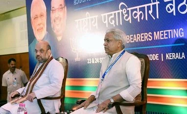 Anti-CAA protesters shouting 'kagaz nahin dikhayenge' will lose: RSS leader BJP National President Amit Shah (L) and party leader Ram Lal at the inauguration of the party's National Council Meeting in Kozhikode, Kerala
