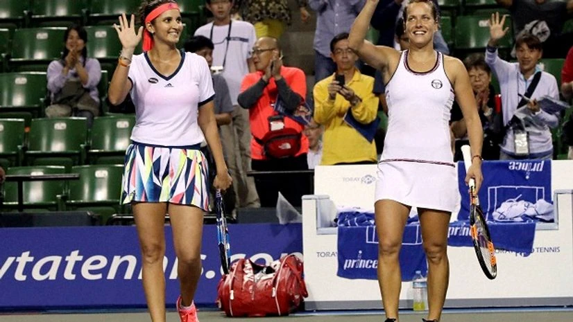 Sania Mirza, left, of India, and her partner Barbora Strycova, of the Czech Republic. Photo:AP|PTI Sania Mirza, left, of India, and her partner Barbora Strycova, of the Czech Republic. Photo:AP|PTI