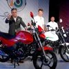 From(L)to(R) Pawan Munjal CMD,HMCL with Markus Braunsperger Chief Technology Officer,HMCL and Malo Le Masson Head Global Product Planning, HMCL at the launch of All New Achiever-150  Dalip Kumar