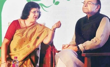 Govt to implement Khan panel views in 6 months Finance Minister Arun Jaitley with State Bank of India Chairman Arundhati Bhattacharya in Mumbai