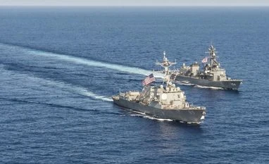 10 sailors missing as US Navy destroyer collides with tanker near Singapore Arleigh Burke-class guided-missile destroyer USS Mustin (DDG 89) transits in formation with Japan Maritime Self-Defense Force ship JS Kirisame (DD 104) during bilateral training in South China Sea. Photo: Reuters
