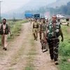Security forces move towards Mankote village during an encounter in Mendhar sub division of Poonch district, in Jammu and Kashmir on Friday. PTI Photo