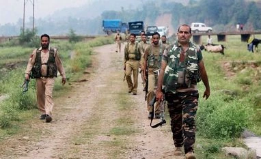 Pak troops shell villages, forward posts along LoC, IB in Poonch and Kathua Security forces move towards Mankote village during an encounter in Mendhar sub division of Poonch district, in Jammu and Kashmir on Friday. PTI Photo